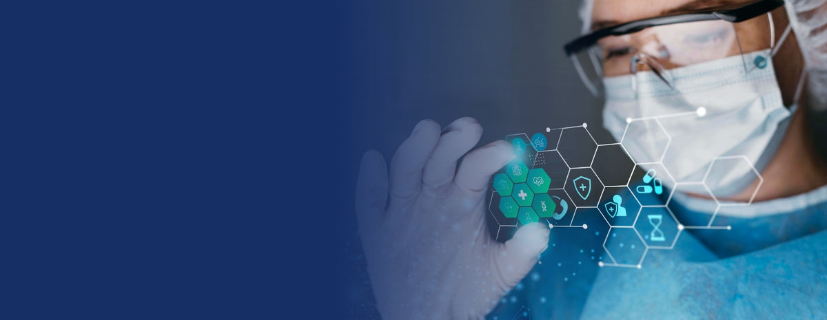 A close-up of a healthcare worker in a blue surgical gown and face mask, wearing protective eyewear and holding a small green medical specimen under a transparent cover. A digital hexagonal medical overlay graphic is superimposed on the right side of the image against a dark blue gradient background.